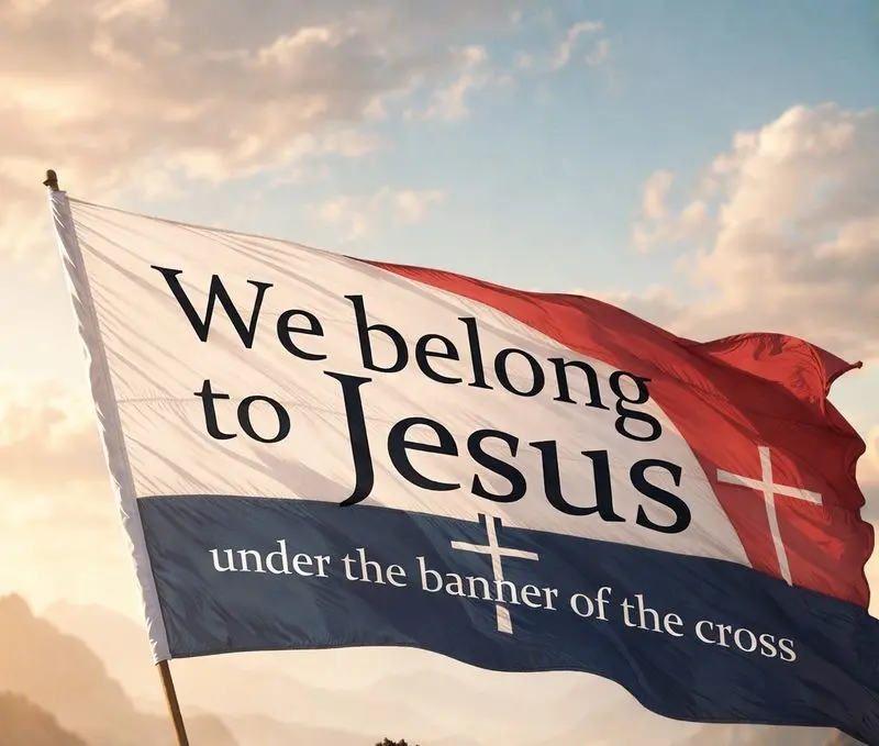 A flag waving against a sunrise sky reads: We belong to Jesus, under the banner of the cross.